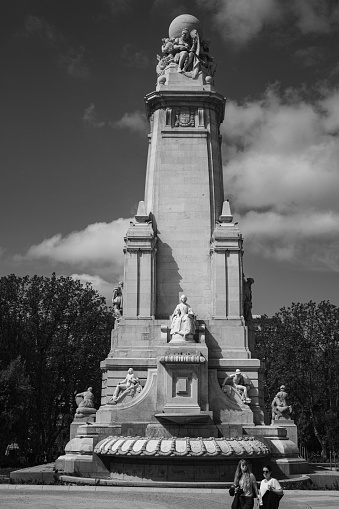 madrid, Spain – May 02, 2022: A vertical shot of the famous tourist monument of Madrid, Spain in grayscale