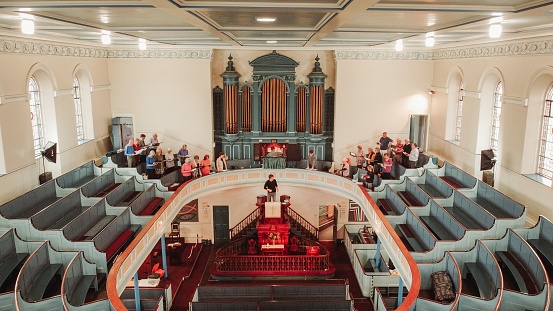 Leeds, United Kingdom – May 14, 2022: An interior of a church with singing choir in Leeds, United Kingdom