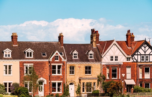 A beautiful shot of old brick houses in a row on a sunny day in England