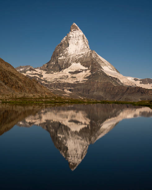 istock Famous Matterhorn mountain with the reflection on the lake 1456141054