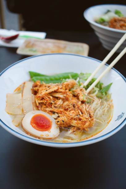 istock Delicious Tonkotsu ramen served on a bowl with chopsticks 1456141339