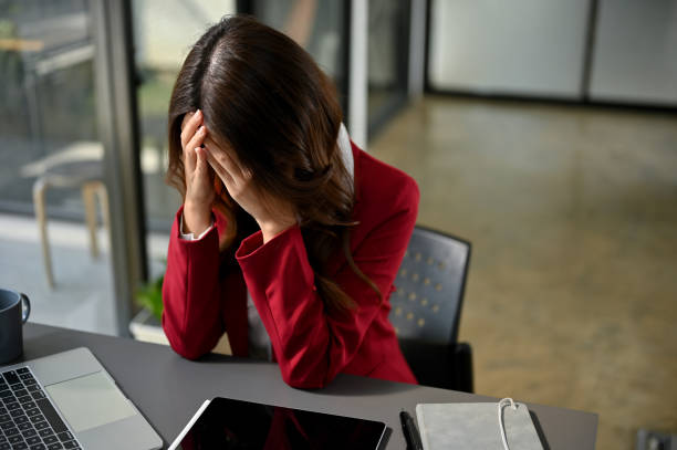 https://media.istockphoto.com/id/1456142983/photo/stressed-and-depressed-asian-businesswoman-crying-at-her-desk-in-the-office-feeling-down.jpg?s=612x612&w=0&k=20&c=LrBZ7TCHxOkVMAgUKreVngx7ipzEOrqlR0LWKykUG0w=