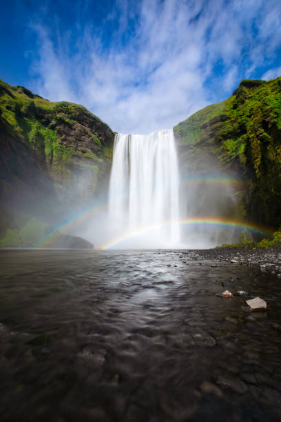 Beautiful shot of a waterfall in the Iceland mountains A beautiful shot of a waterfall in the Iceland mountains lindsay stock pictures, royalty-free photos & images