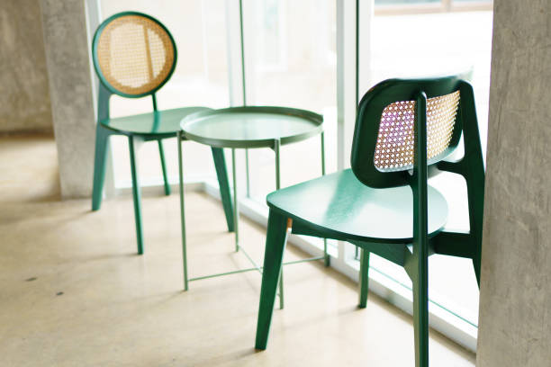 istock Room corner with a metal green table and chairs 1456143405