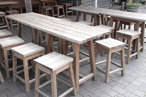 chairs and tables in an empty beer garden