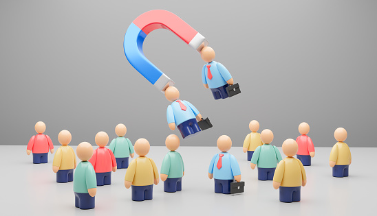Selection of workers. Magnet as symbol attracts good employees. 3d render.