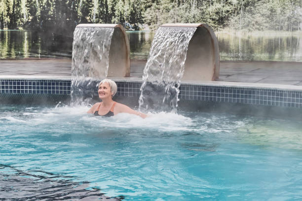 istock Mature woman in thermal pool. 1456148529