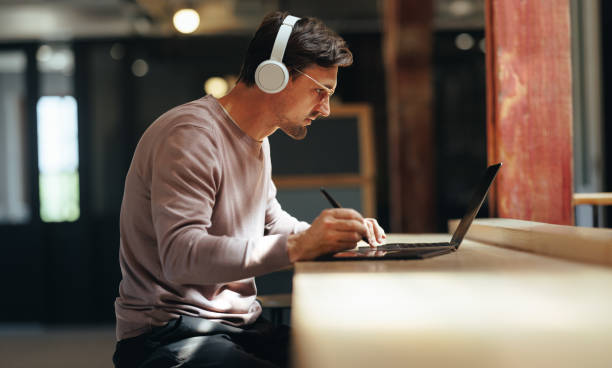 istock Freelance graphic designer working in a coworking space 1456154646