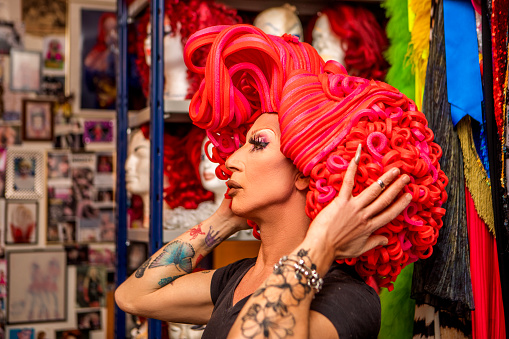 Drag Queen choosing a wig for a performance