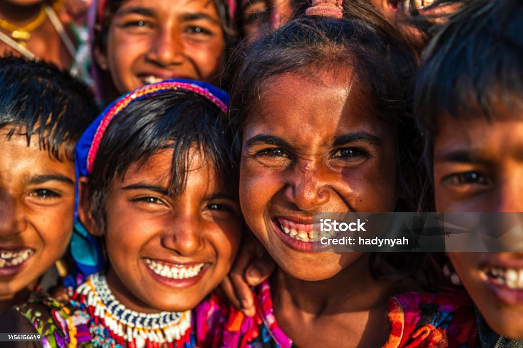 Group of happy Gypsy Indian children, desert village, India Group of happy Gypsy Indian children - desert village, Thar Desert, Rajasthan, India. India Stock Photo