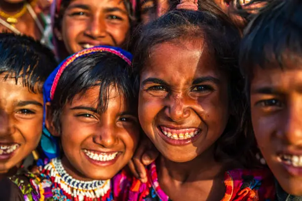 Photo of Group of happy Gypsy Indian children, desert village, India