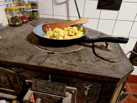 An antique kitchen oven used in swiss homes in the last centuries before electricity was avilable. The image was captured in the canton of glarus.
