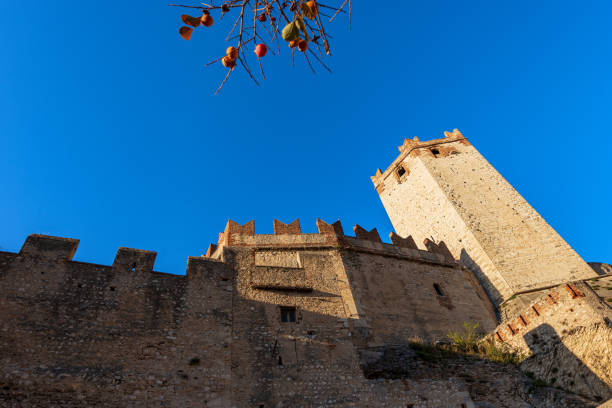 Medieval Scaligero Castle of Malcesine Tourist Resort on Lake Garda - Verona Italy stock photo