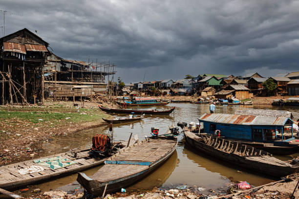istock Poor Cambodians living in poverty along a river 1456160537