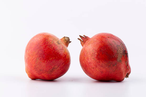 istock Ripe red pomegranate on a white background 1456163209