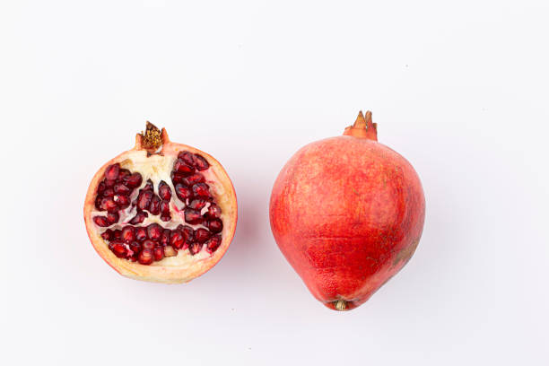 istock Piece of Fresh ripe pomegranate isolated 1456163213