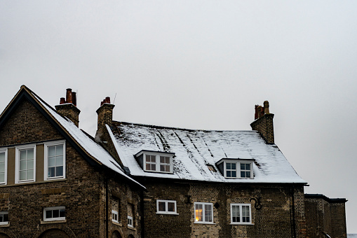 Rooftops in the snow in Cambridge, Cambridgeshire.
