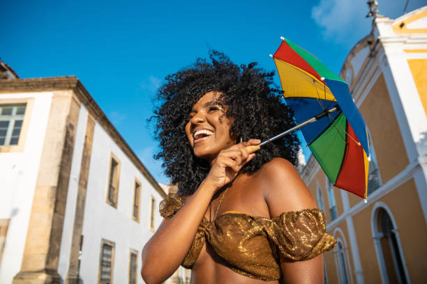 cultura brasiliana - candid women african descent umbrella foto e immagini stock