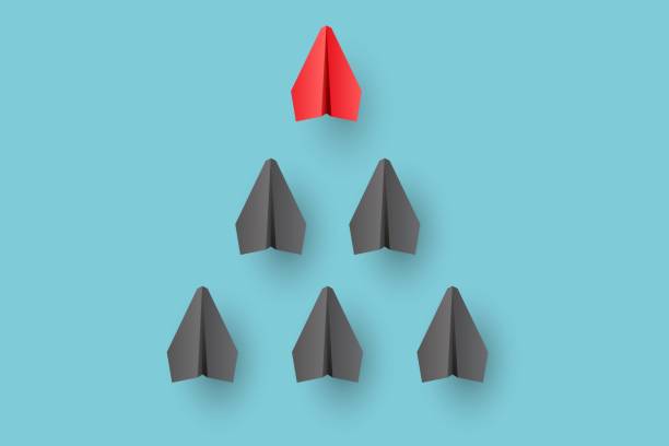 istock Individual red leader paper plane lead other. Business and leadership 1456168542