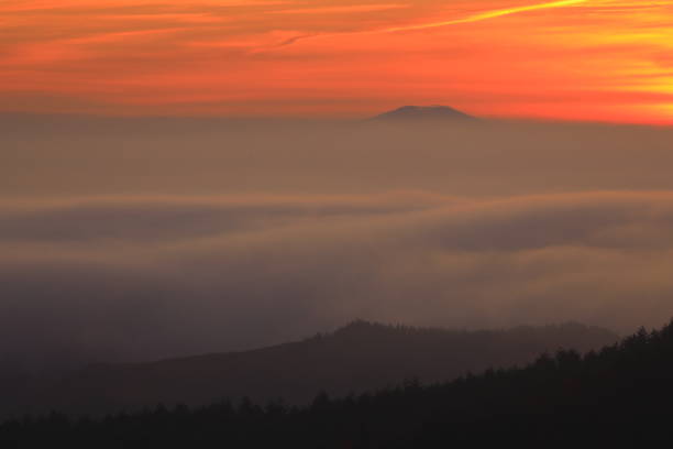 istock sunrise sea of clouds 1456168855
