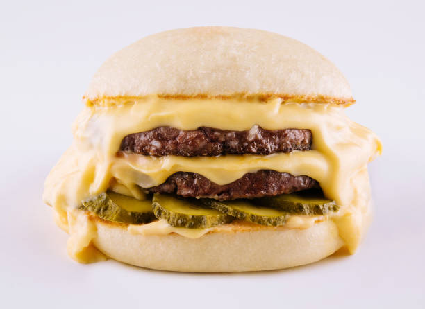istock hamburger with two cutlets, pickled cucumbers and melted cheese 1456171267
