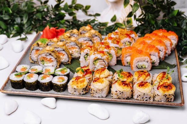 istock different types of sushi rolls on big plate 1456171354