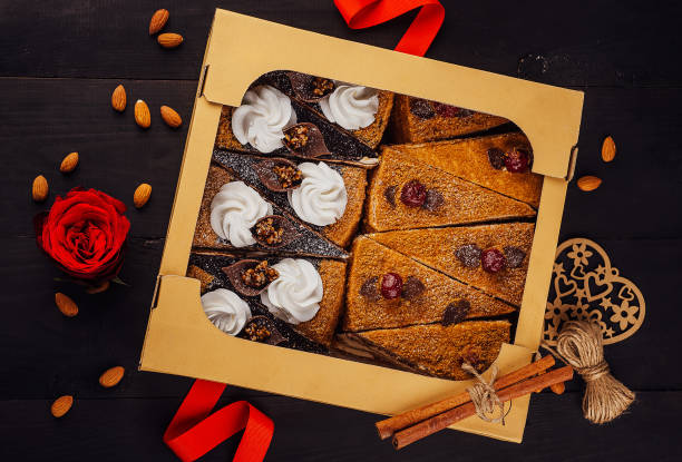 sliced pieces of cake in a box stock photo