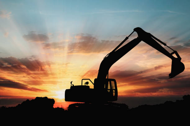 istock Excavators are digging the soil in the construction site . 1456174281