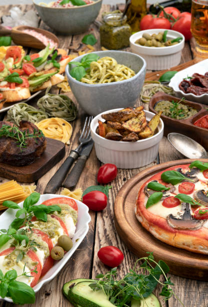 istock Dinner Party table full of food 1456178125