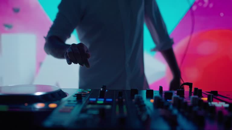 DJ Playing Music in Nightclub