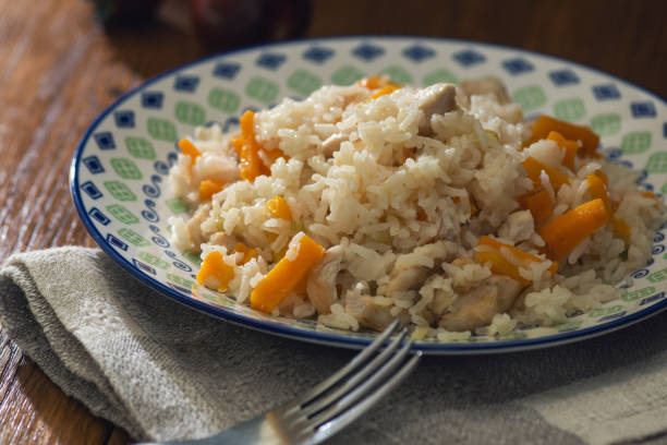 istock Rice porridge with vegetables and meat 1456181423
