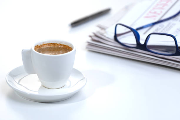 istock newspaper and eyeglasses 1456187314