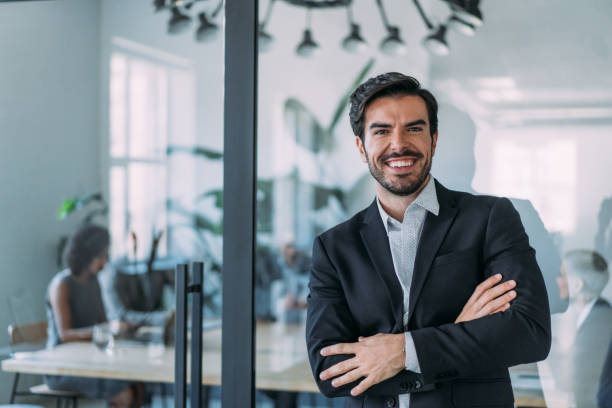 istock Confident businessman and his team. 1456194349