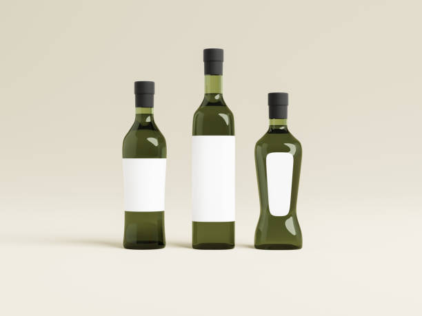 istock Green glass bottles with empty white lables in various shapes, 3d rendering. Cooking vegetable oil vials in isolated background, mockup design 1456196689