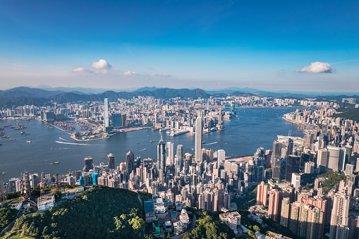 epic panorama of the Victoria Harbour and commercial area of Hong Kong, outdoor, daytime, aerial view
