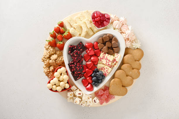 istock Charcuterie Valentines Day board with chocolate sweets. 1456197073