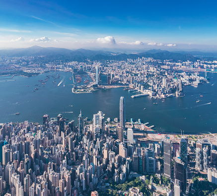 epic panorama of the Victoria Harbour and commercial area of Hong Kong, outdoor, daytime, aerial view