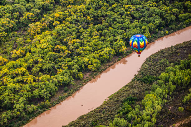 istock Hot Air Balloon Floating over the Rio Grande. 1456199965