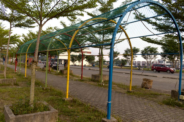 istock jogging track with colorful iron gates 1456200780