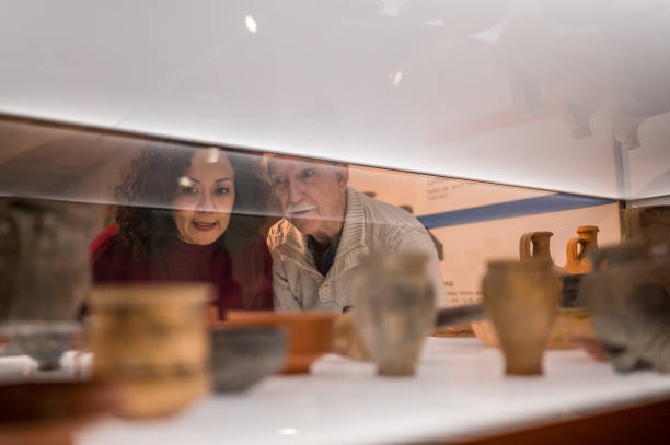 istock Attractive Old Couple on a Date at the Museum 1456201405