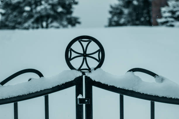 Snowy Gate of Udzo monastery Snowy Gate of Udzo monastery , Tbilisi, Georgia covered wagon horse cart snow winter stock pictures, royalty-free photos & images