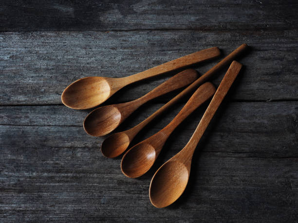 istock wooden spoon on wood background 1456204239