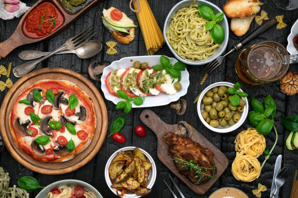istock Dinner Party table full of food 1456207293
