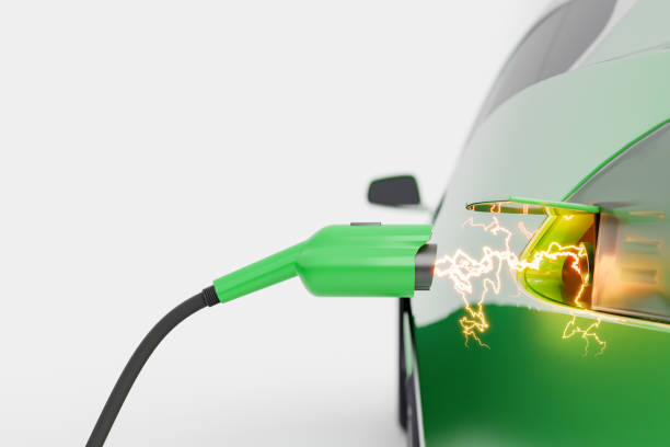 istock Electric plug charging green car 1456208763
