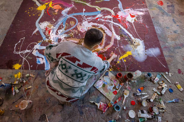 istock Modern abstract artist in his studio 1456210746