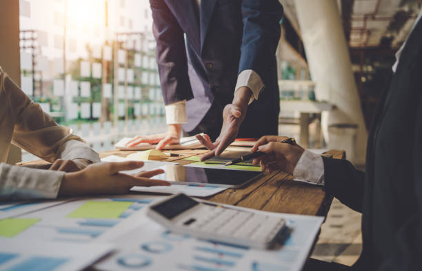 istock Teamwork process, business people discussing planning strategy new business development and ideas at meeting. 1456214118