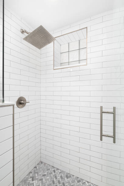 istock A shower with subway and herringbone tiles. 1456214686