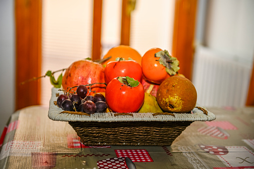 Autumn fruit bodebon on the kitchen table