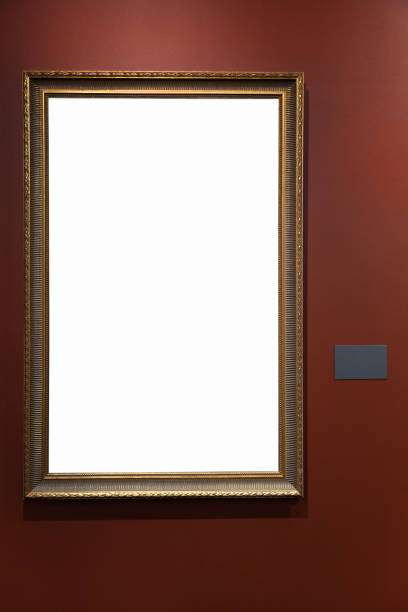 istock Golden vintage frame isolated on red wall in museum. 1456218930