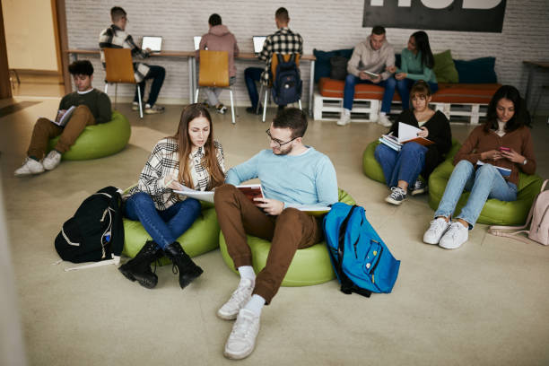 istock Large group of students learning at casual classroom. 1456219850